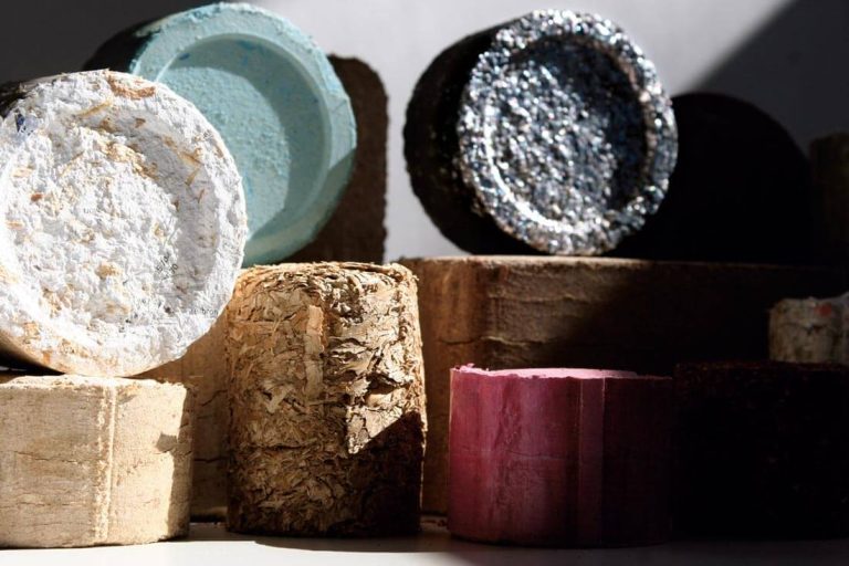 10 or so briquettes of various material stacked up