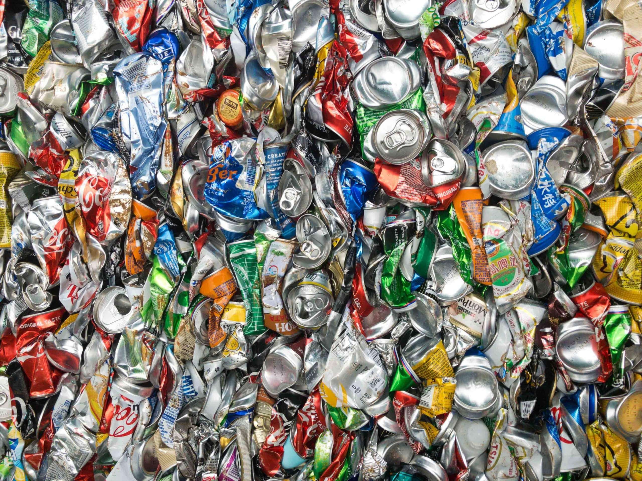 Compressed aluminum cans for recycling