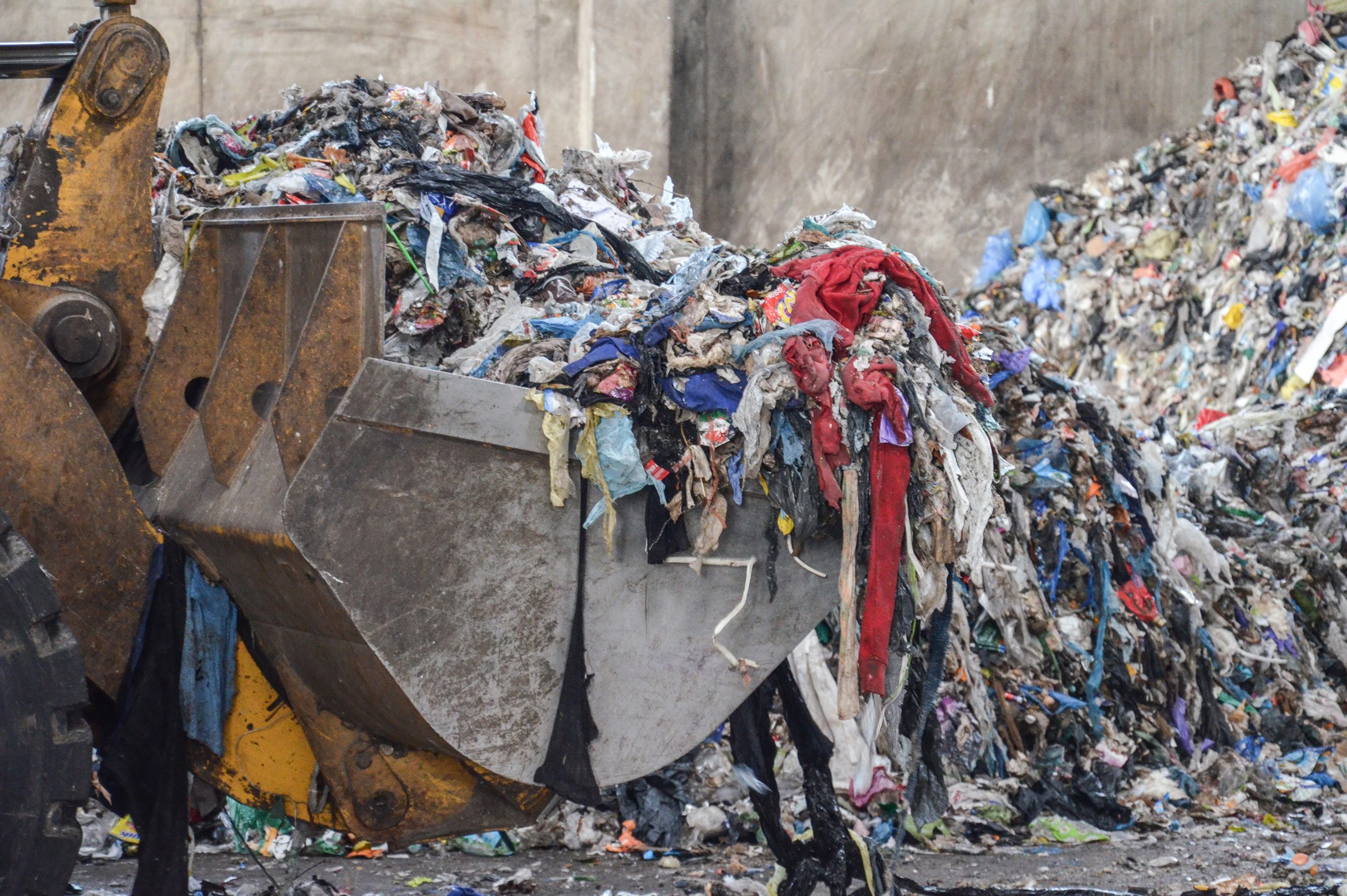 Refuse derived fuel is transported on excavator shovel
