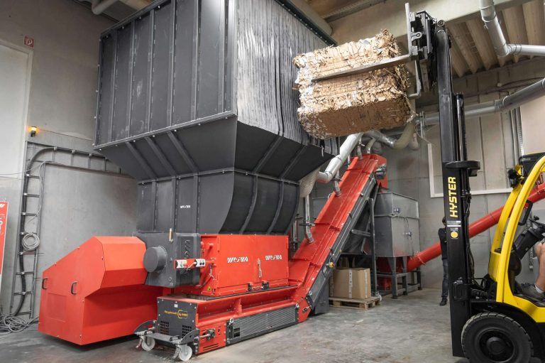 The WEIMA shredder is fed by forklift.