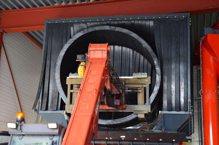 2.5 diameter pipe cuttings are loaded into the WEIMA shredder