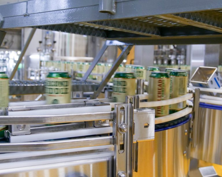 The Fiddlehead canning line for beer cans is attached to the PUEHLER can press for recycling