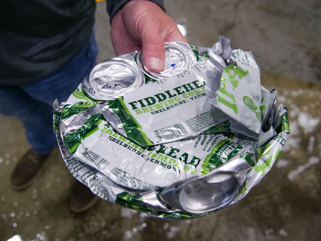 Compressed aluminum cans are easy to recycle.