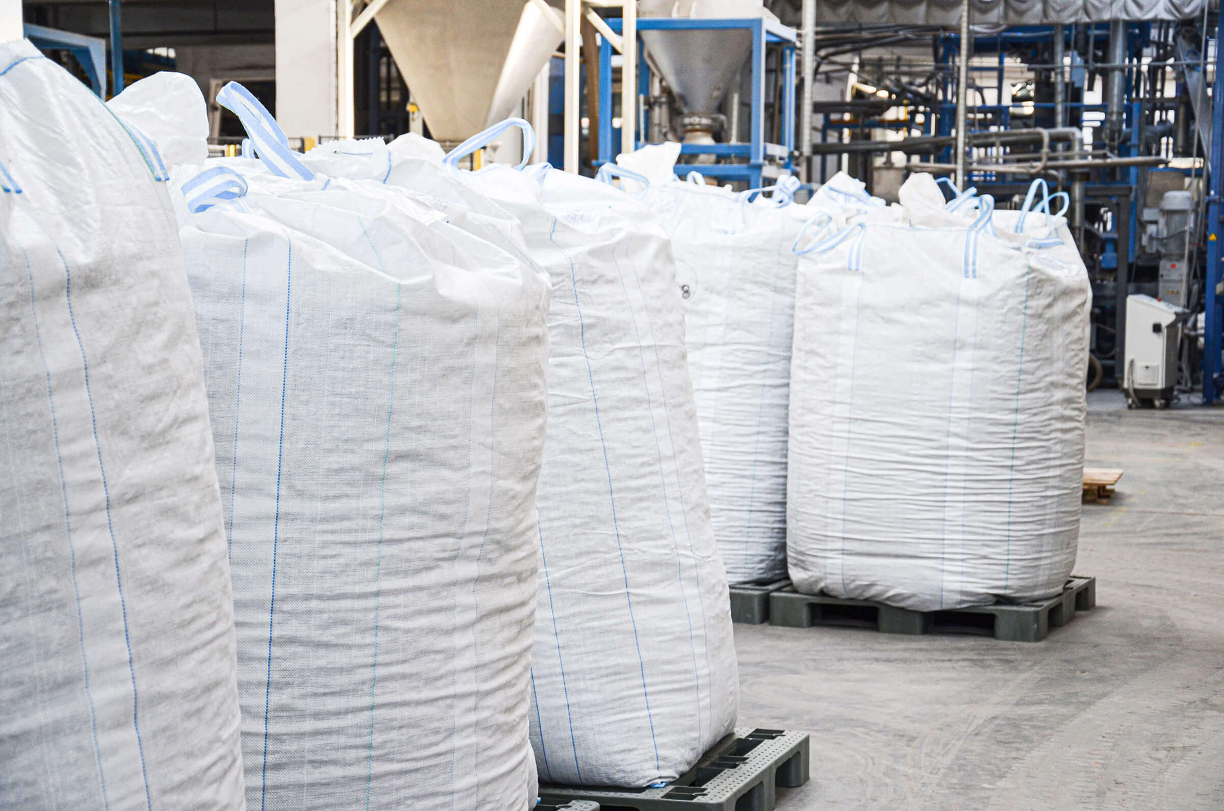Logistic center with filled big bags for transportation