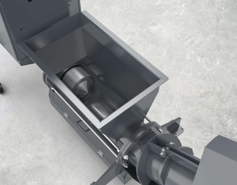 Blick in den Trichter. Darin ist der Pressstempel im Presskanal und der Verzicht auf eine Förderschnecke zu sehen.