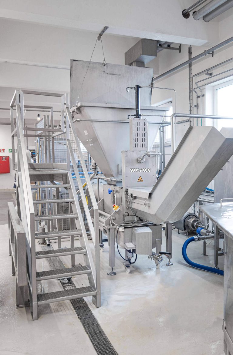 Rework press in switzerland for milk boxes