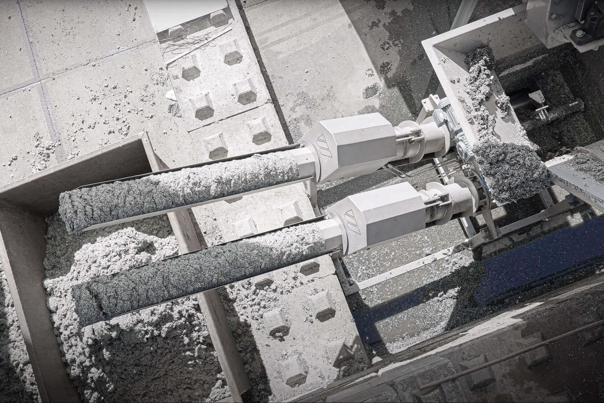 two puehler press discharge pipes with plastic material