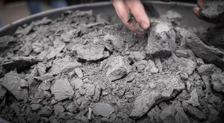 pieces of dried drilling mud, sludge and slurry