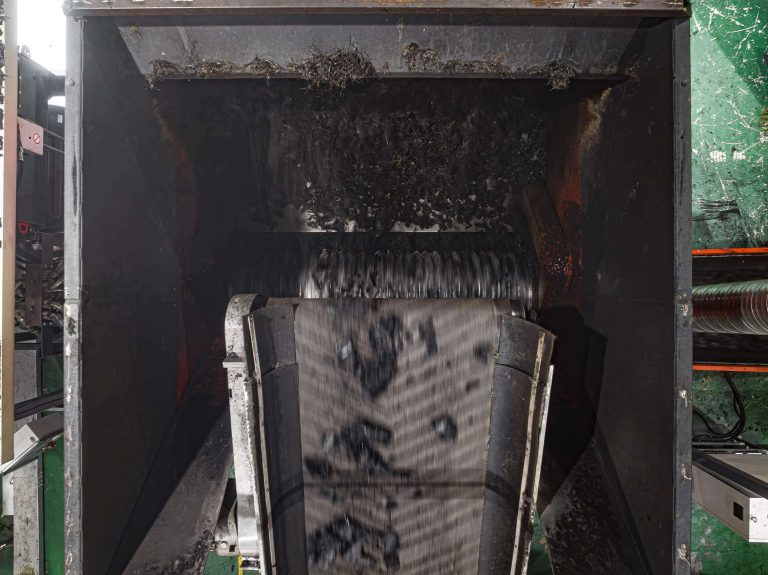 View inside a shredder shredding tires