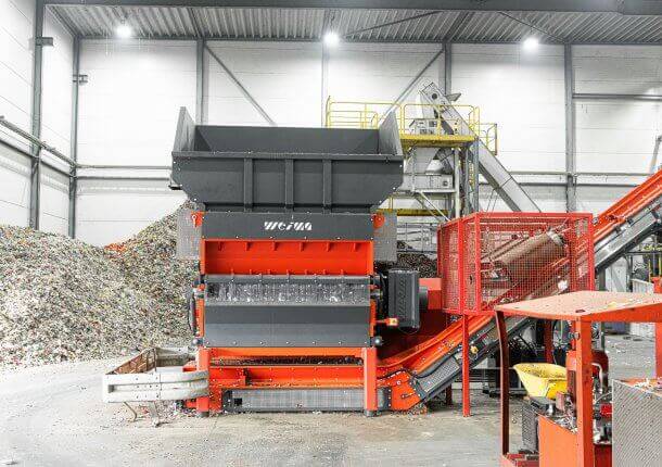 Plastic shredders and granulators for recycling and reintegrating scrap