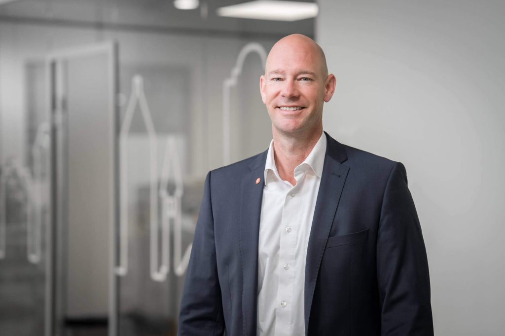 WEIMA CSO Kay trained in front of a glazed office