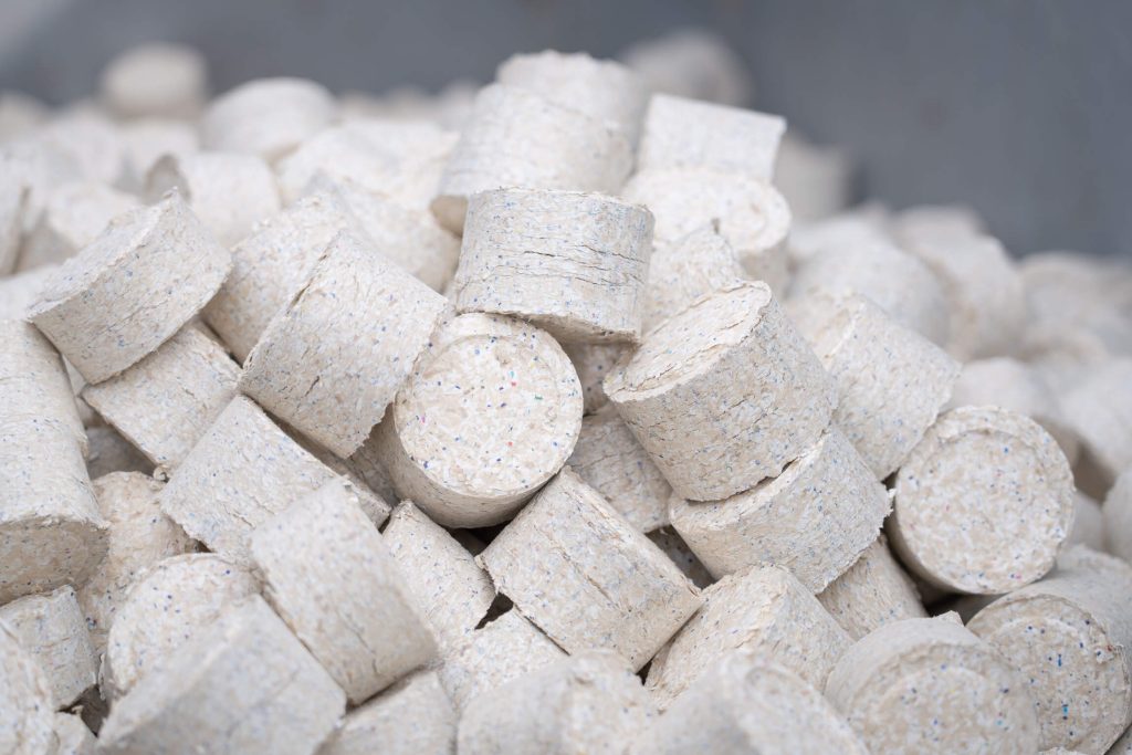 Many briquettes stored in a hall