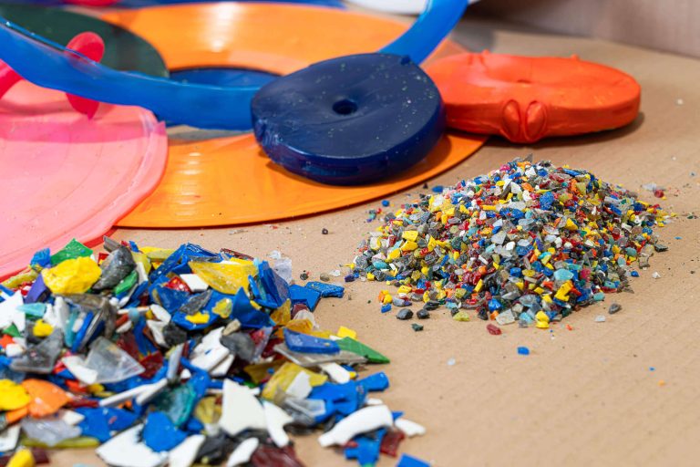 Vinyl records shredded and granulated into colorful flakes