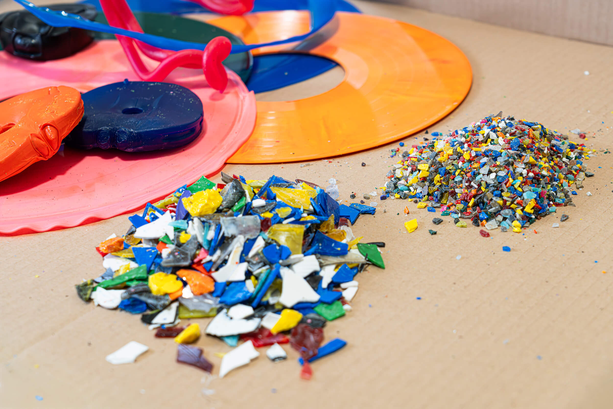 Vinyl records shredded and granulated into colorful flakes