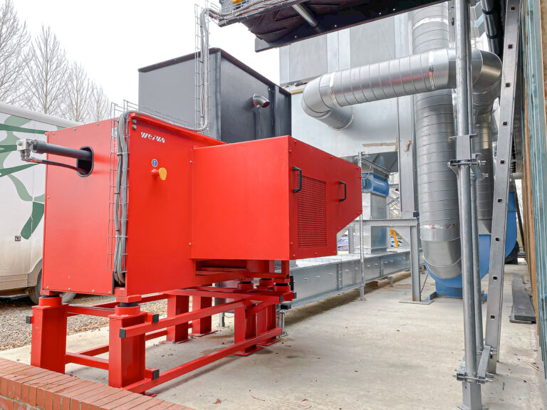 Side view of the WEIMA WLK 6 S shredder with solid steel frame and extraction connection