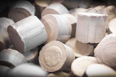 Briquetted MDF dust in briquette form