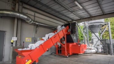 Paper recycling with a WEIMA WLK 10 shredder with extraction system