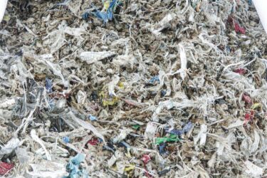 Shredded rejects of plastic, metal