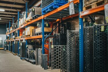 new wear parts stacked in a warehouse