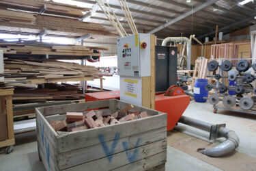 Filled WEIMA wood grinder with waste wood at Paarhammer