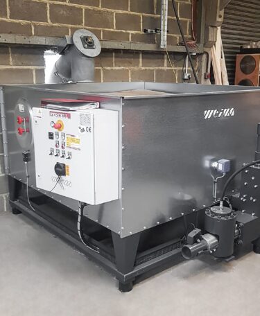 Briquetting press for wood waste at Hutchings Timber