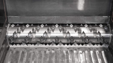 F rotor for fibers, veneer, ropes, strings and big bags