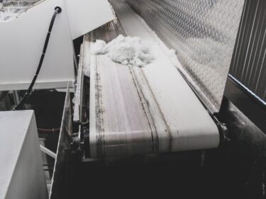 optical swarf on a conveyor belt
