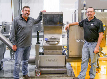 WEIMA employees aside PUEHLER E.200 drainage press for aluminum cans