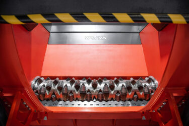Shredder Rotor umgeben von orangenem Maschinengehäuse von WEIMA