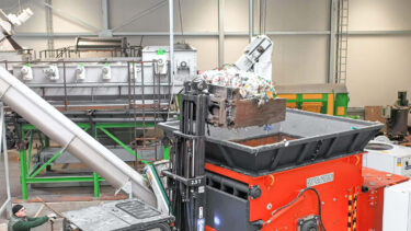 orange weima shredder fed by forklift at stiphout plastic production site
