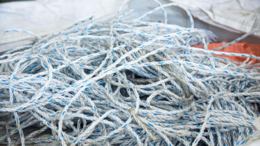 white and blue ocean ropes inside a big bag