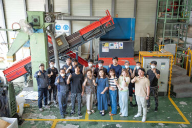 Korean workers standing in front of a WEIMA WLK 1500 Shredder for fishing nets