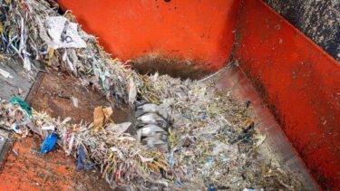 View inside shredder with rotor shredding pulper waste rope