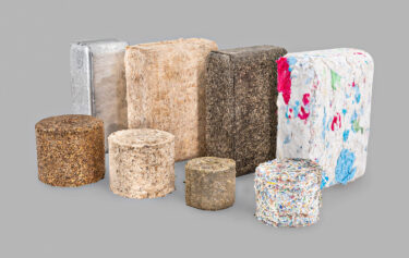 Briketts aus Holz, Papier, Metall und Biomasse