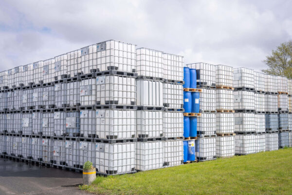 Stacked containers standing on the Dansk Emballage premises in Denmark