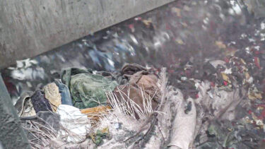 Textiles are shredded in a WEIMA shredder; a view inside the shredder's cutting chamber