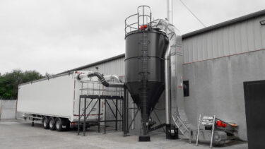 An MPD mini-silo, with a truck to its left that is currently being loaded.